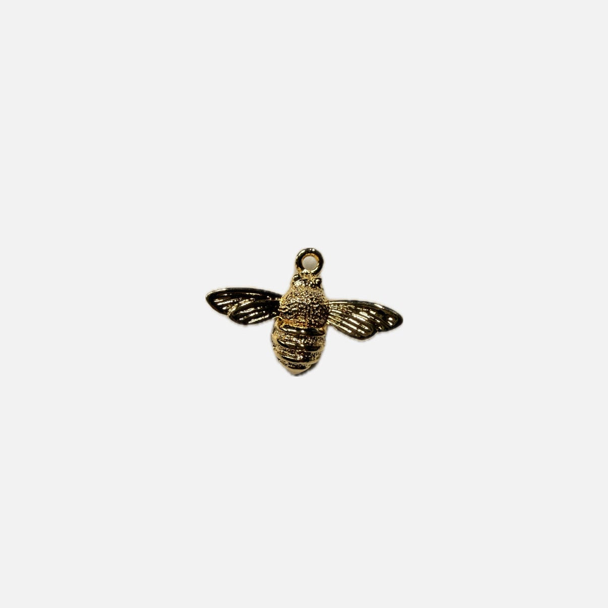 Gold bee design on a white background