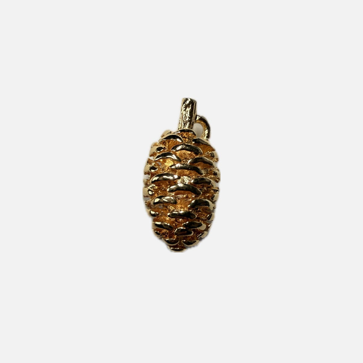 Gold pine cone pendant on white background