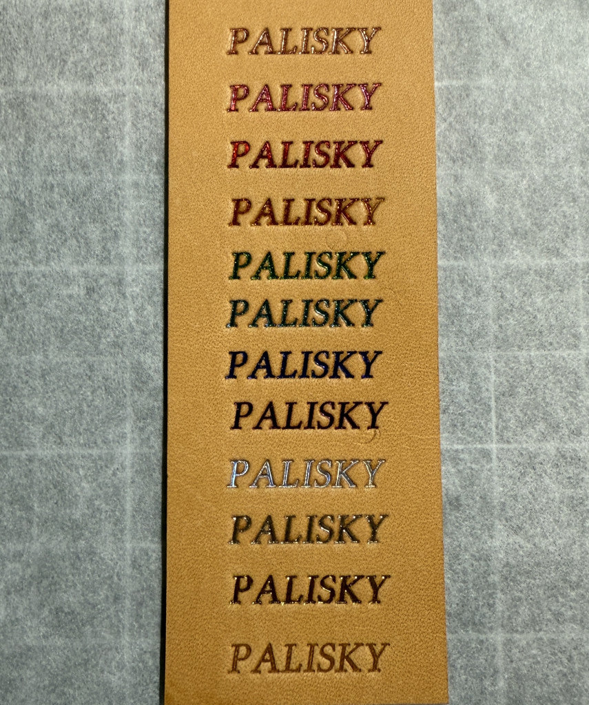 'PALISKY' text on natural leather in multiple foil colors